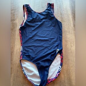Plum Region 5 gymnastics leotard. AXS